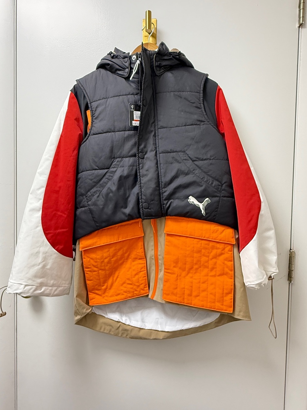 Puma Black Puffer Vest with Red Sleeves and Orange Front Pockets